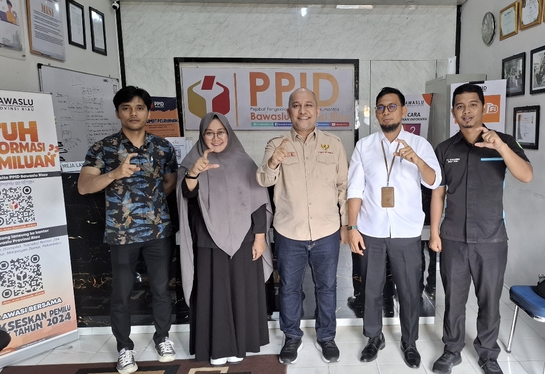 Bawaslu Riau Terima Kunjungan Tim Monev Keterbukaan Informasi dari Komisi Informasi (KI) Riau